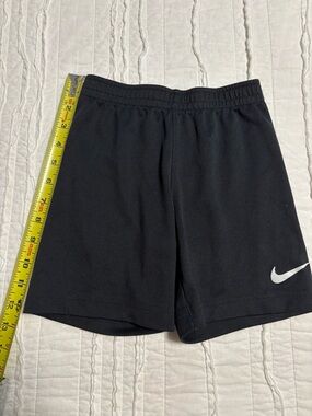 Nike Black Shorts with White Swoosh Logo